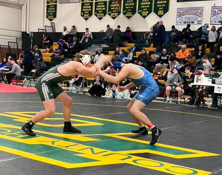 Two wrestlers sparring